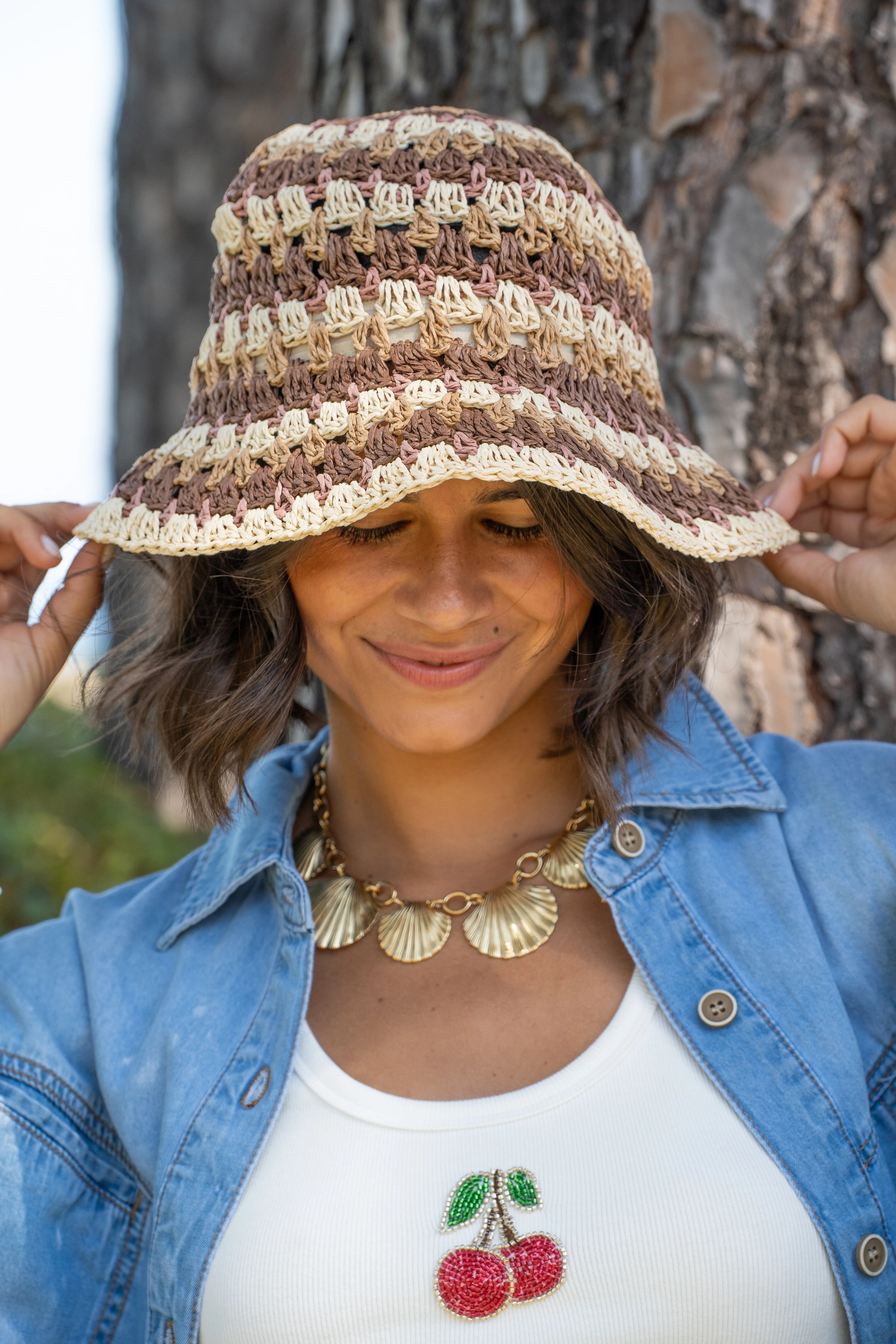 Chapeau rayé en raphia - Image 6